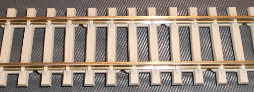 1 bo�te de 25 rails code 100 � traverses en  b�ton - 