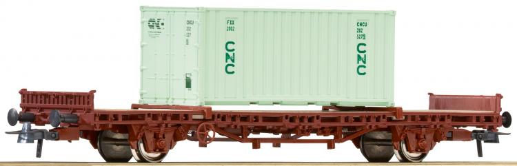 Wagon plat charg d'un container CNC - 
