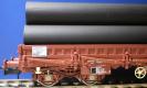 Wagon plat � bogies  charg� de tubes